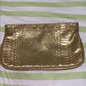 Gold Guess clutch